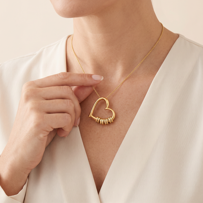 The Heart of the Family necklace worn